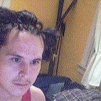 3rd: Me begining sectioning my hair it more less an brick lay uneven griddish...crazy pattern of 3/8-1 in squares (some trianglez in front to round it out)...